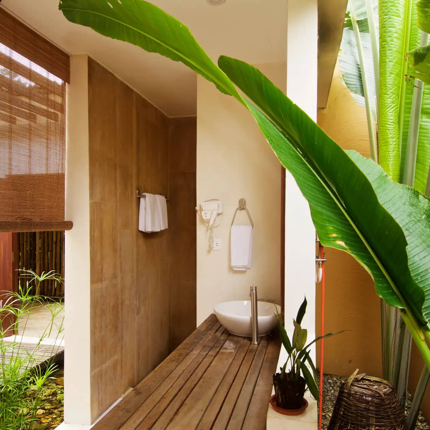 Bathroom open to a planted courtyard